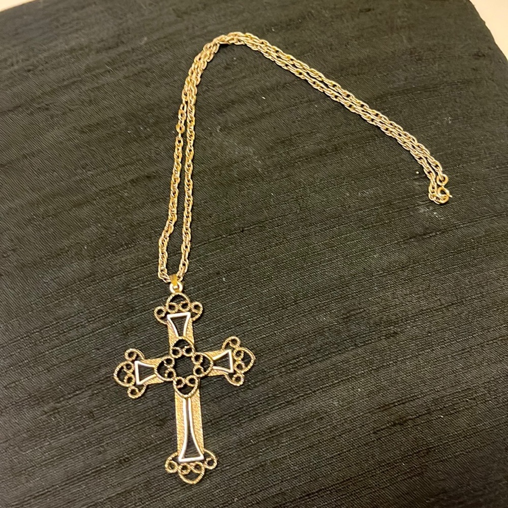 Monet limited edition, 1973 gold tone cross pendant. 24 inch long chain.